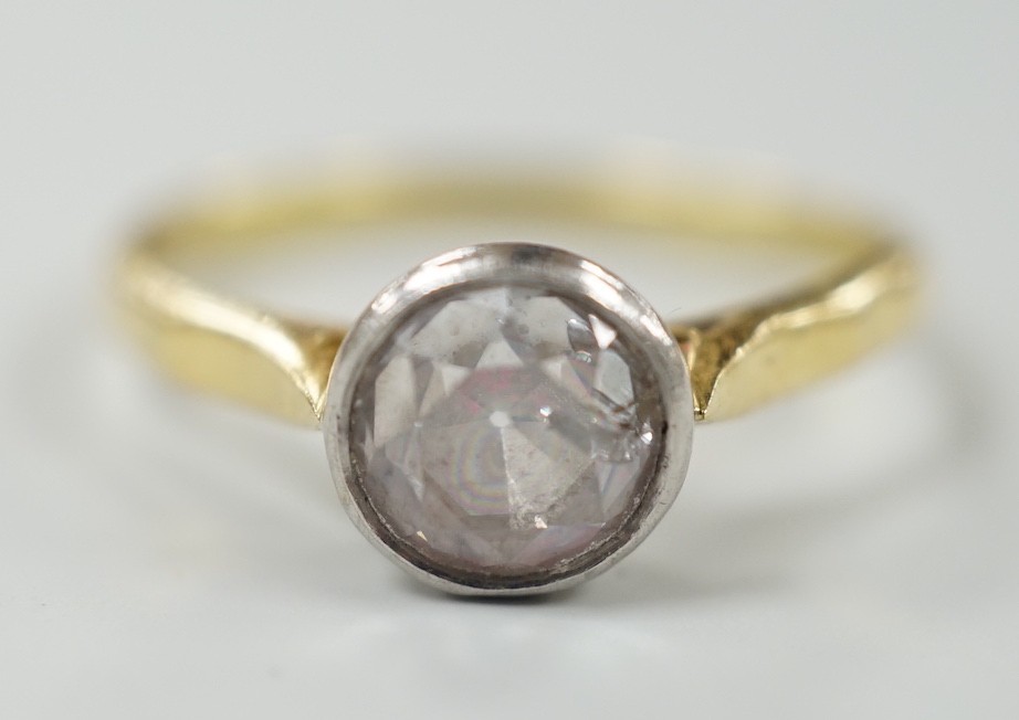 A modern 18ct gold and collet set solitaire diamond ring, size N, gross weight 3.1 grams, the stone diameter approx. 6.1mm